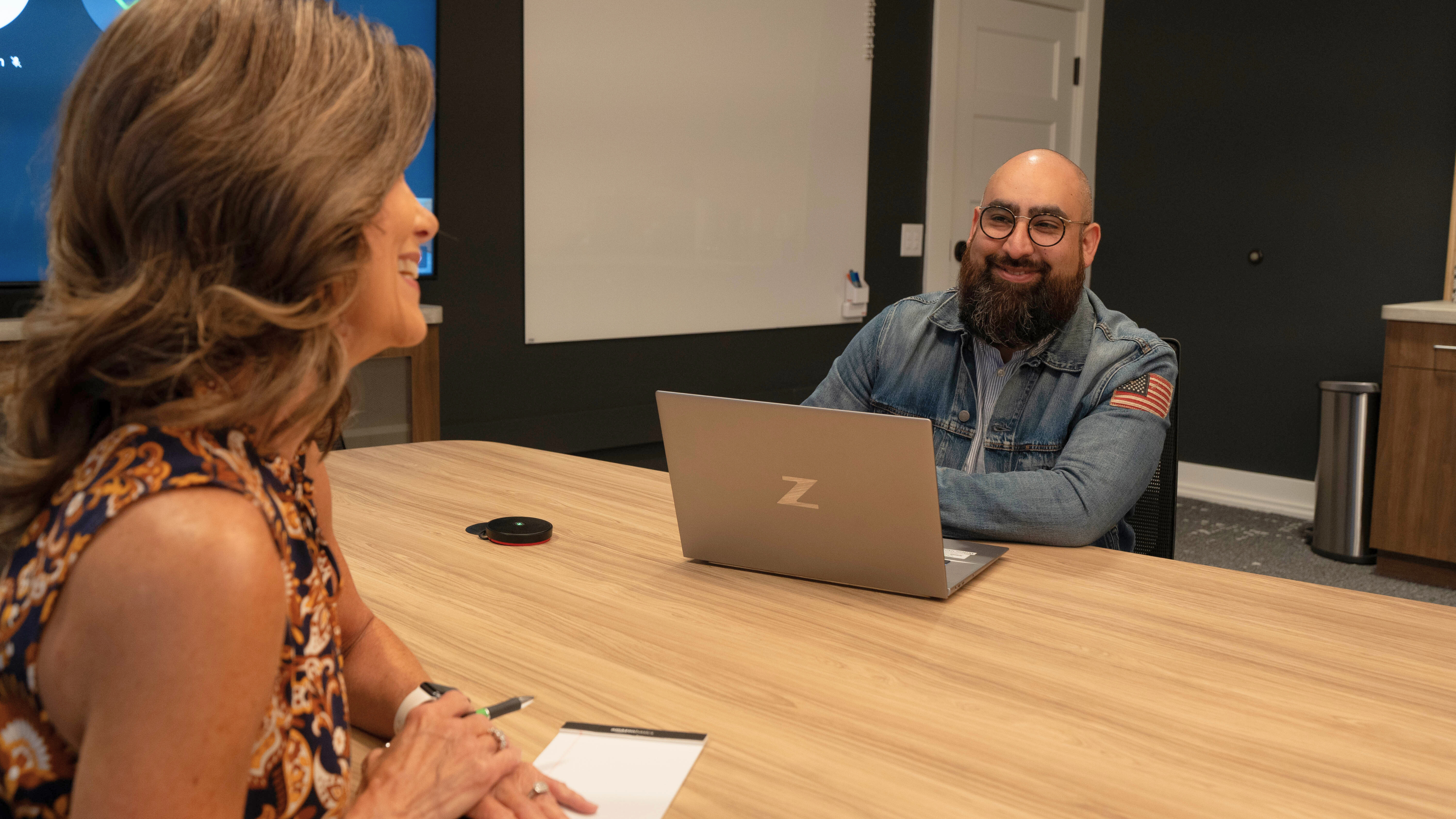 IT team working in a conference room. 