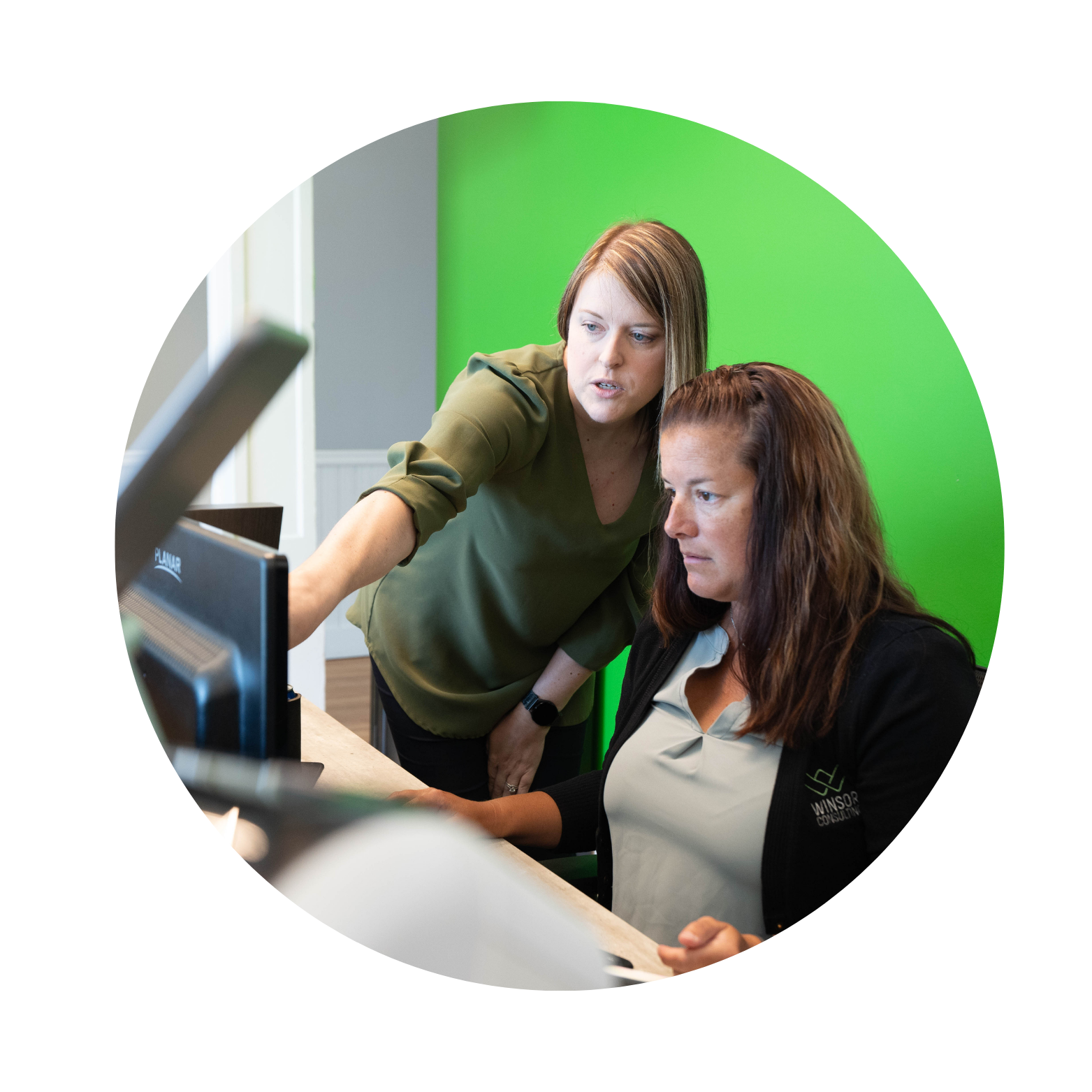 IT and cybersecurity professionals working on a project. 